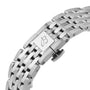 Close-up of a stainless steel bracelet with a fold-over clasp engraved with the letter B, highlighting the iconic Navitimer 32 design by Breitling and housing the precise Breitling Calibre 77.