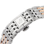 Close-up of the Breitling Navitimer 32 bracelet, featuring alternating silver and 18K red gold links with a clasp engraved with B—a perfect match for the iconic style.
