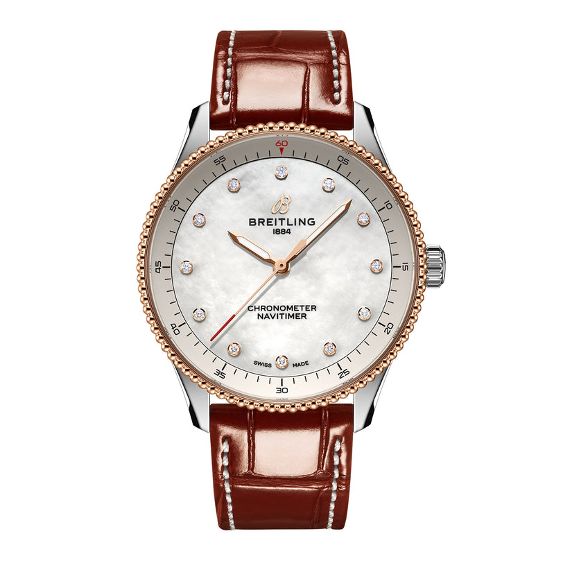 The Breitling Navitimer 32 features a brown leather strap, white dial, rose gold bezel, diamond hour markers, and silver hands.