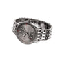The Breitling Navitimer Automatic 36 wristwatch features a stainless steel band, gray dial, date display, and textured bezel, shown against a white background.