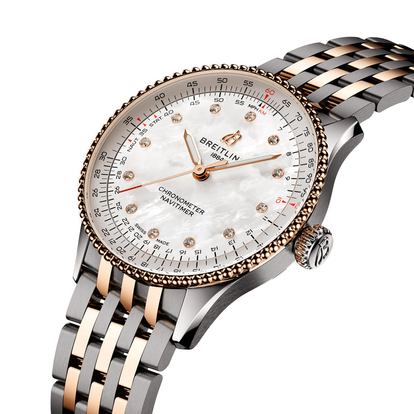 The Breitling Navitimer Automatic 36 features a mother-of-pearl dial, diamond hour markers, and a silver and rose gold two-tone metal bracelet.