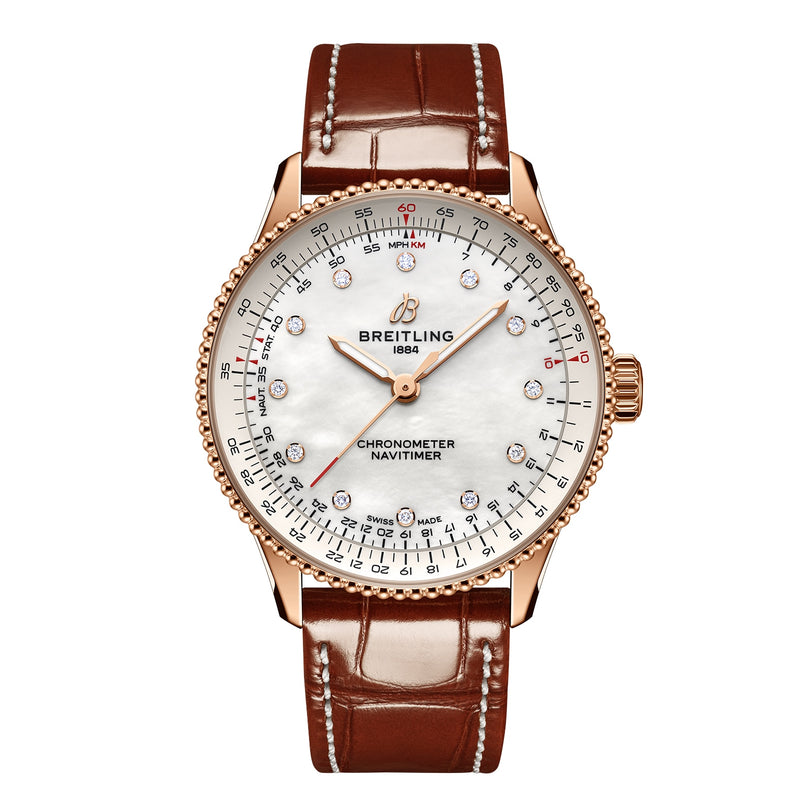 The Breitling Navitimer Automatic 36 features a brown leather strap, rose gold case, white dial with diamond hour markers, multiple chronometer functions, and is powered by the precise Breitling 17 calibre movement.