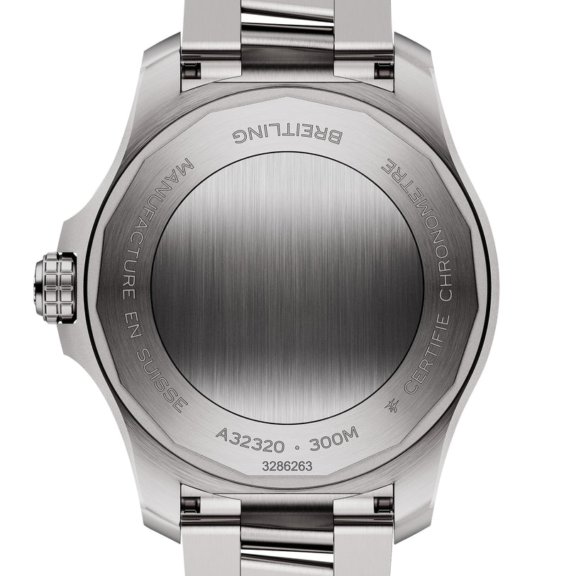 Close-up of the Breitling Avenger Automatic GMT 44s case back, showing engravings such as MANUFACTURE EN SUISSE, 300M water resistant, stainless steel, and the reference number A32320.