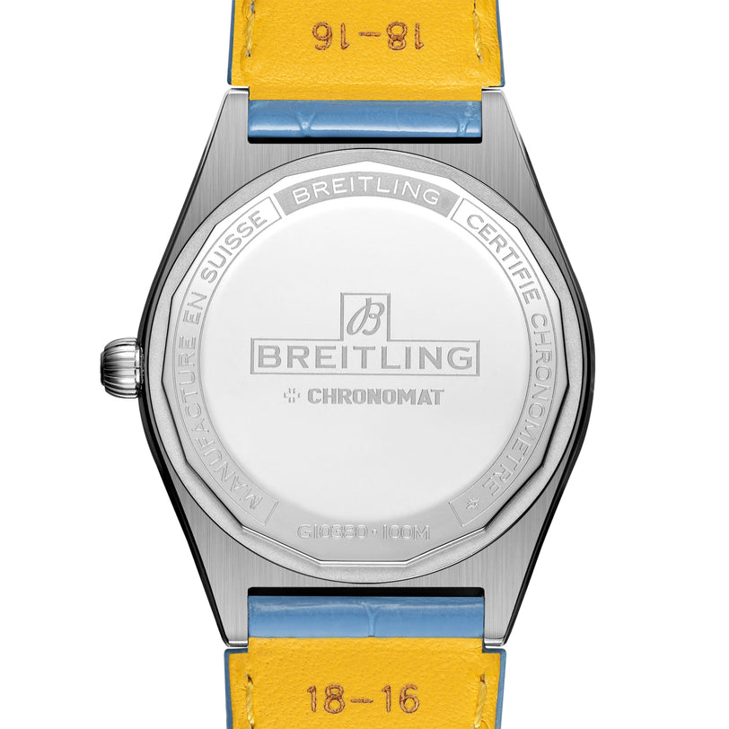The Breitling Chronomat Automatic 36 South Sea features a silver case back with an engraved logo, certification details, and a yellow leather strap from the exclusive collection.