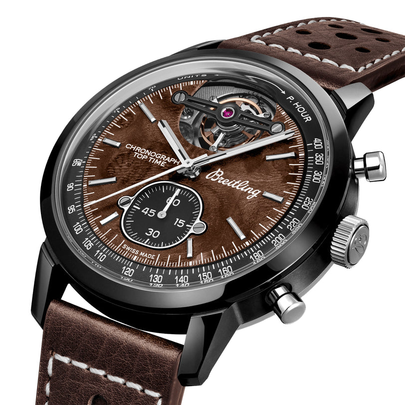 Close-up of the Breitling Top Time B21 Chevrolet Corvette, featuring a brown leather strap, open-heart dial showcasing the balance wheel, and racing chronograph subdials inspired by classic sports cars.