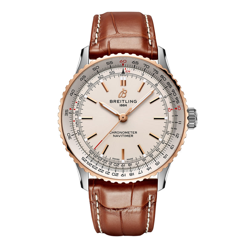 The Breitling Navitimer Automatic 41 features a cream dial, rose gold bezel, brown leather strap, and multiple scales—an iconic timepiece crafted for aviation enthusiasts who value precision and timeless style.