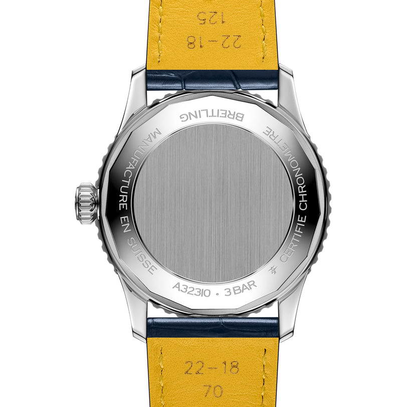Rear view of the Breitling Navitimer Automatic GMT 41, a 41mm stainless steel chronograph watch, displaying its engraved case back and yellow leather strap.
