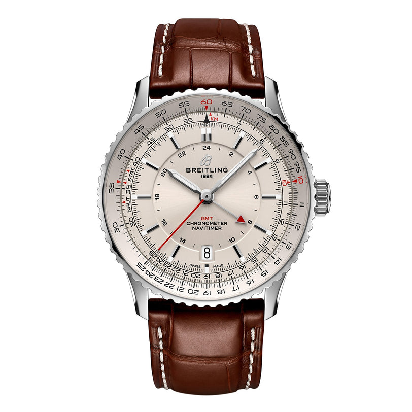 The Breitling Navitimer Automatic GMT 41 features a silver dial, 41mm stainless steel case, brown leather strap, multiple subdials, and a date window at 6 o’clock.