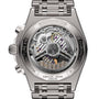 Close-up of the back of a Breitling Chronomat B01 42, showcasing its exposed automatic movement, engraved details, and sleek metal bracelet.