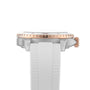 Side view of the Breitling Superocean Automatic 36, a stainless steel dive watch with a white textured strap and rose gold fluted bezel, inspired by the iconic Superocean design.