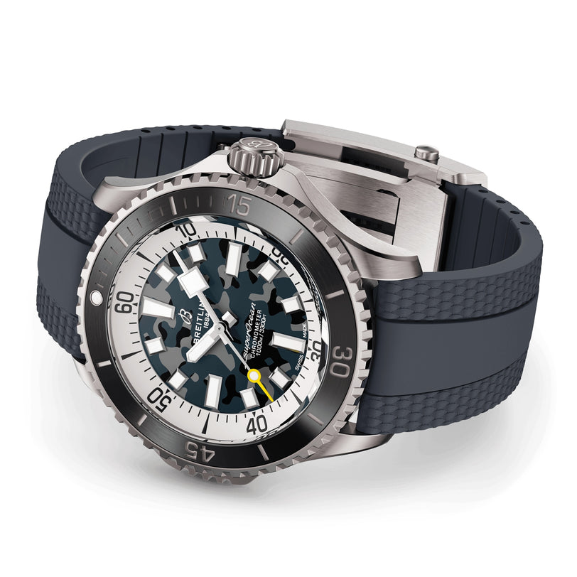 The Breitling Superocean Automatic 46 Super Diver features a titanium case, stainless steel, black and white camouflage dial, yellow seconds hand, and a dark textured rubber strap.