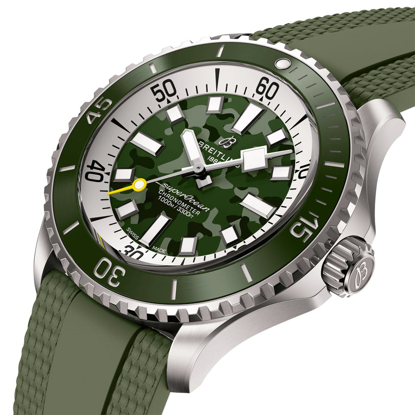 The Breitling Superocean Automatic 46 Super Diver features a stainless steel case, green camouflage dial, silver bezel, yellow seconds hand, olive green textured rubber strap, and the precise Breitling 10 calibre movement.