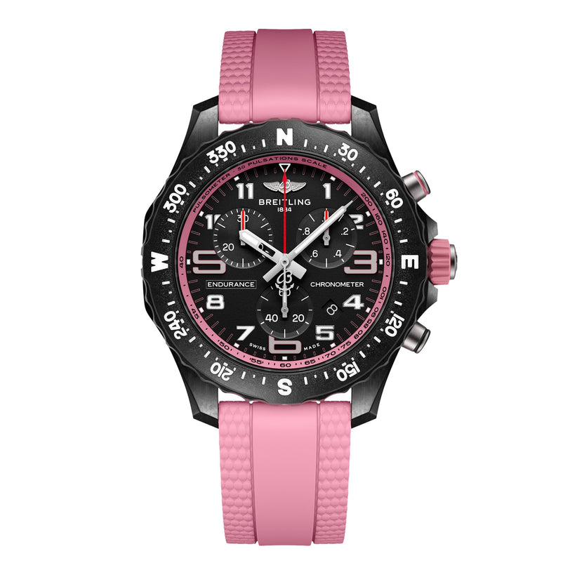 The Breitling Endurance Pro 38 is a black athleisure watch with a pink strap and bezel accents, featuring a Breitlight case, cardinal directions on the bezel, and multiple sub-dials on the face.