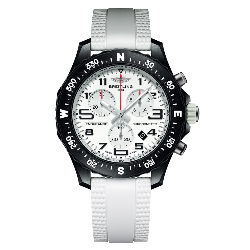 The Breitling Endurance Pro 38 The Watches Of Switzerland Group Exclusive features a white dial, black compass-marked bezel, and a white textured rubber strap—a luxurious choice for fans of precision craftsmanship.