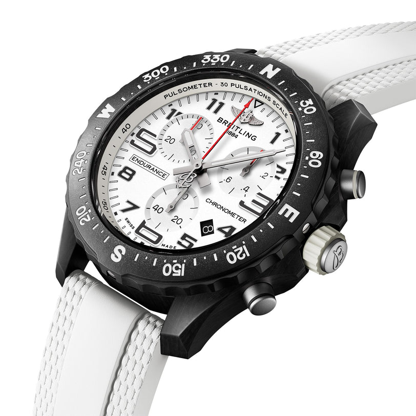 The Breitling Endurance Pro 38 The Watches Of Switzerland Group Exclusive is a luxury chronograph with a white dial, black bezel, three subdials, and textured white strap—exemplifying precision chronometer-certified movements.