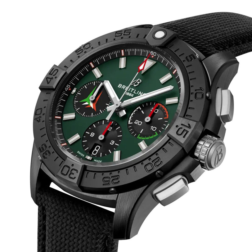 The Breitling Avenger B01 Chronograph 42 features a black and green design, three subdials, a black rotating bezel, and a black fabric strap, inspired by the Frecce Tricolori aerobatic squadron.