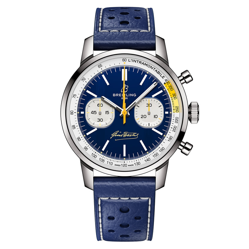 The Breitling Top Time B01 Gino Bartali features a blue leather strap, blue dial with white and yellow accents, two subdials, minute-marked bezel, and visible crown with pushers on the right.