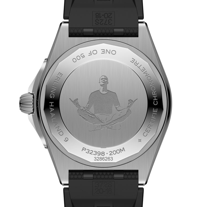 The back of the Breitling Chronomat Automatic GMT Erling Haaland watch features an engraving of a meditating person, Erling Haaland 9, and serial numbers.