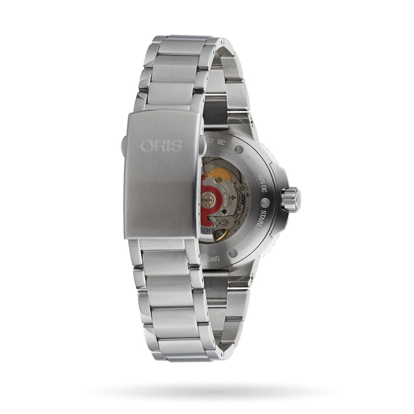 The Oris Aquis Date Relief watch features a stainless steel clasp and a transparent case back that reveals the movement.