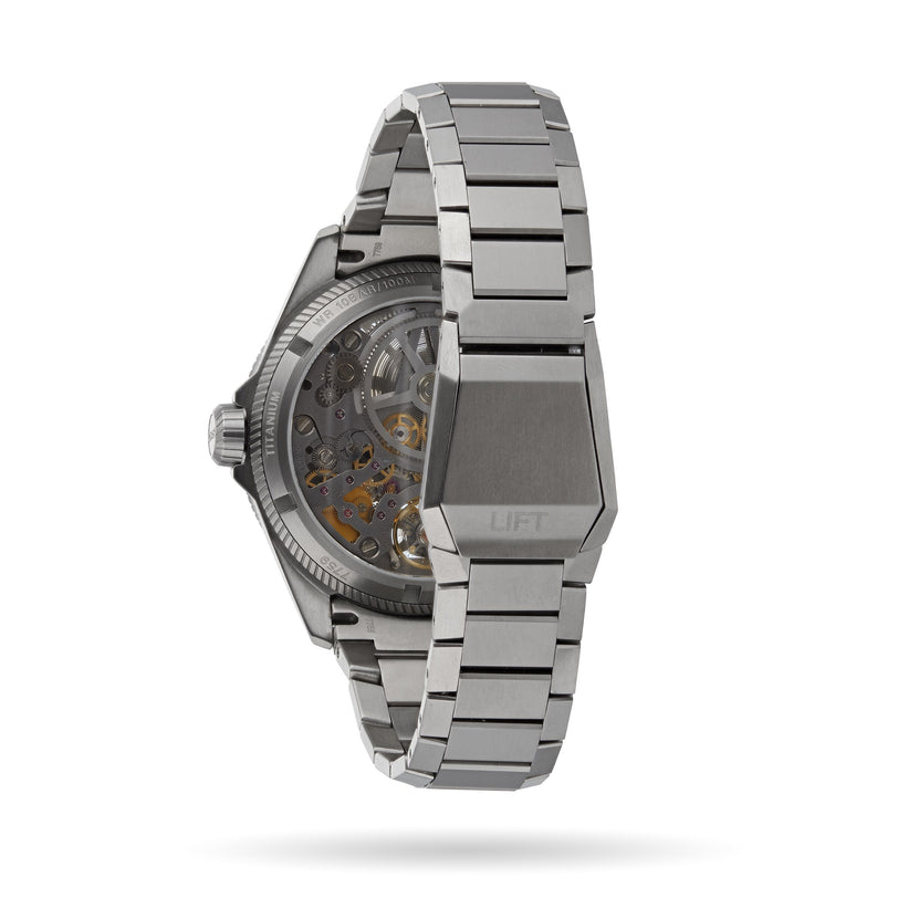 The Oris ProPilot X Calibre 115 is a Swiss Made stainless steel wristwatch with a visible skeleton movement, intricate gears seen from the back and side, and LIFT engraved on the clasp—a mechanical masterpiece.