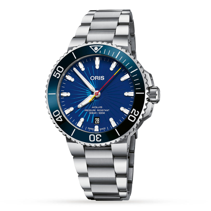 An Oris Aquis Sun Wukong Limited Edition wristwatch featuring a blue dial, date display at 6 o’clock, silver hour markers, and a black rotating bezel.