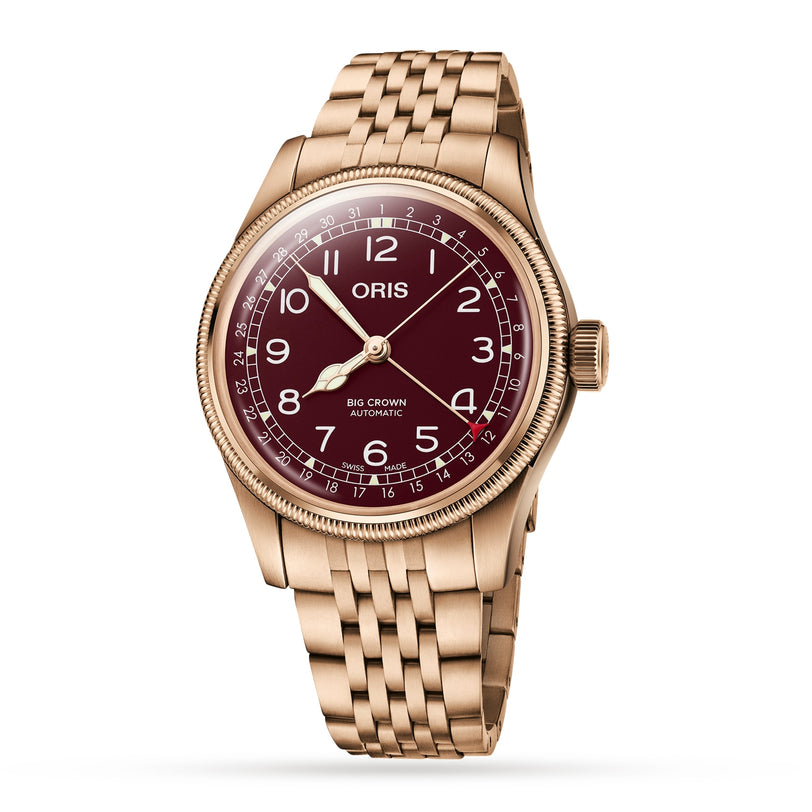 Oris Big Crown Bronze Pointer Date wristwatch with a burgundy dial, Arabic numerals, and a metal link bracelet, shown angled right.