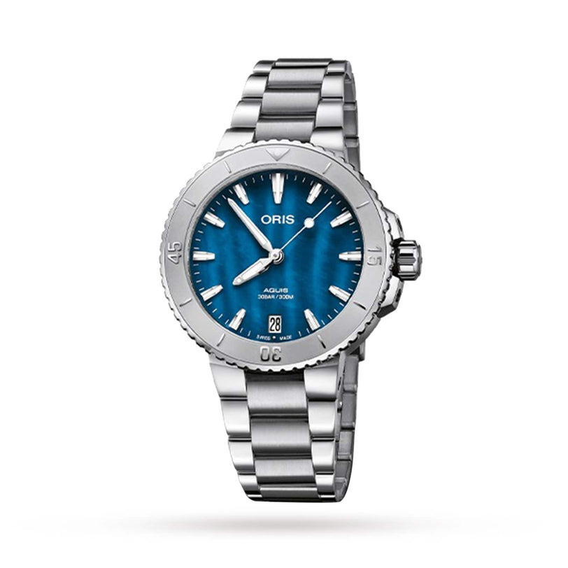 The Oris Aquis Date is a stainless steel divers watch featuring a blue dial, silver markers, date at 6 o’clock, and a metal bracelet, displayed against a white background.