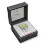 The Oris ProPilot X Kermit Edition, a silver wristwatch with a green face, is shown in an open black and gray Oris watch box featuring The Muppets branding inside the lid.