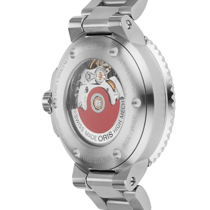 Close-up of the back of the Oris Aquis Oris X Bracenet, highlighting its exposed automatic movement, Swiss Made High Mech inscription, and a hint of Super-LumiNova.