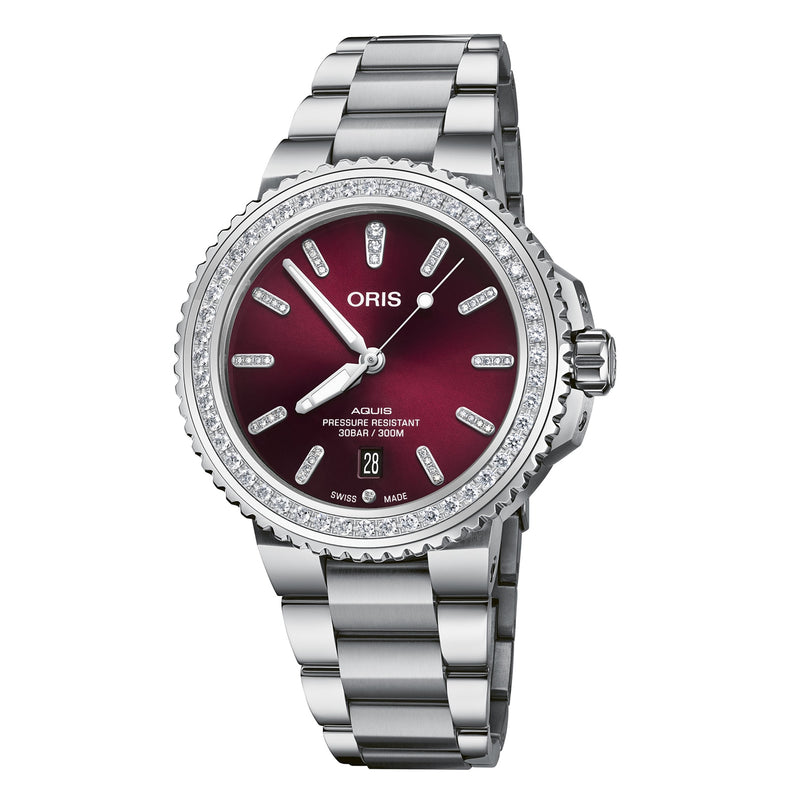 The Oris Aquis Date Diamonds is a silver wristwatch featuring a burgundy dial, diamond hour markers, and a metal bracelet strap.