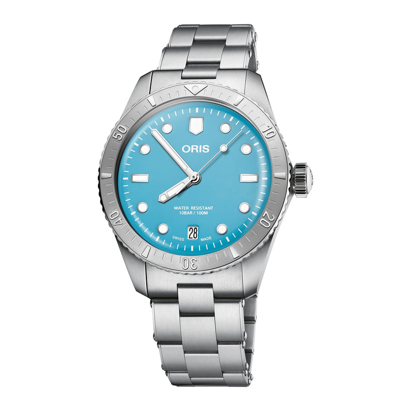 The Oris Divers Sixty‑Five Cotton Candy is a stainless steel wristwatch featuring a turquoise dial and silver hour markers.