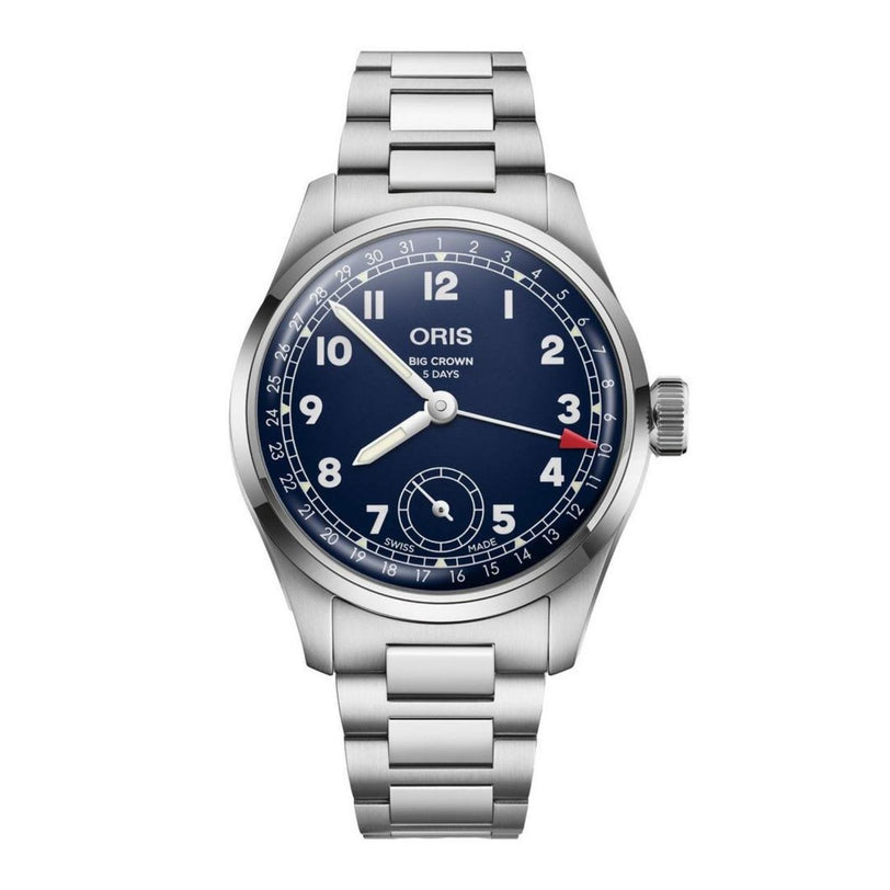 The Oris Big Crown Pointer Date Calibre 403 is a stainless steel wristwatch with a midnight blue dial, Arabic numerals, date pointer, a subdial at 6 o’clock, and a metal bracelet.