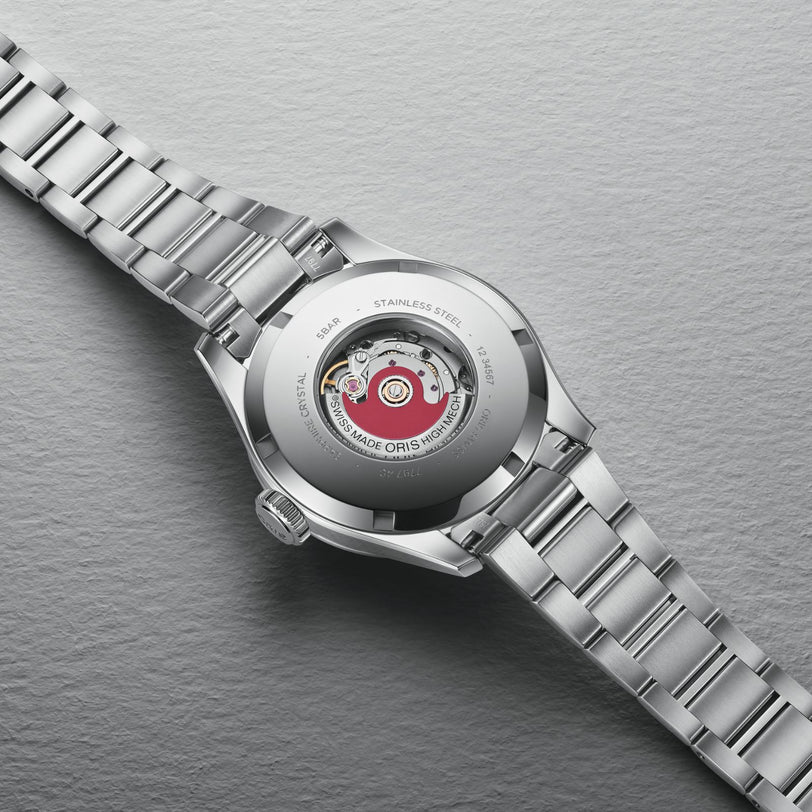 Close-up of the back of the Oris Big Crown Diamonds, revealing its Swiss Made automatic mechanical movement and engraved case specifications.