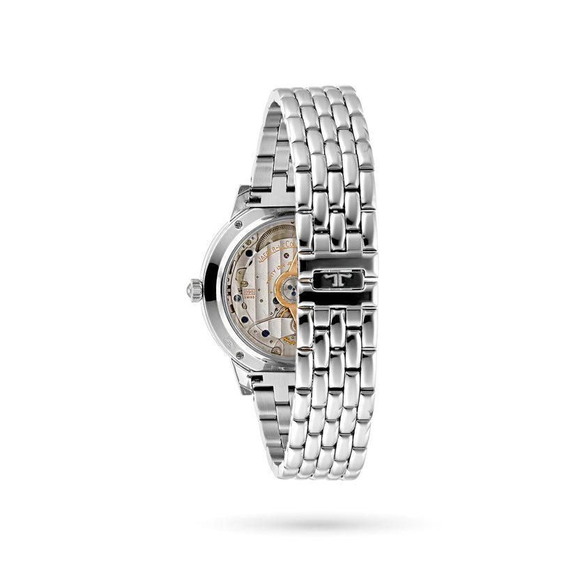 The Jaeger-LeCoultre Rendez-Vous Night & Day is pictured from the side, showcasing a silver metal link bracelet, skeleton dial, and a transparent case back that reveals the fine Swiss automatic movement inside.