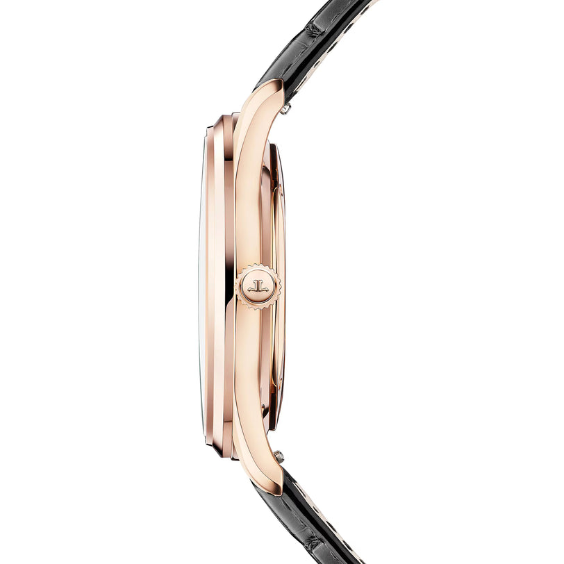 Side view of a slim, gold Jaeger-LeCoultre Master Ultra Thin Perpetual Calendar Automatic with a black leather strap and round crown, showcasing its ultra-thin profile and elegant minimalist design.