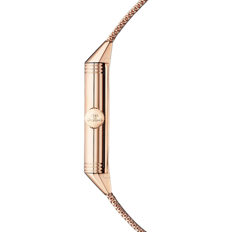 Side view of a slim, rectangular Jaeger-LeCoultre Reverso Tribute Monoface Small Seconds case with engraved logo and matching bracelet, showcasing its golden grained dial against a white background.