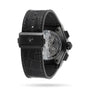 Zenith Defy El Primero 21: a black luxury wristwatch with a textured leather strap, star emblem clasp, transparent case back showcasing the mechanical movement, and signature high-frequency chronograph for precise urban design.