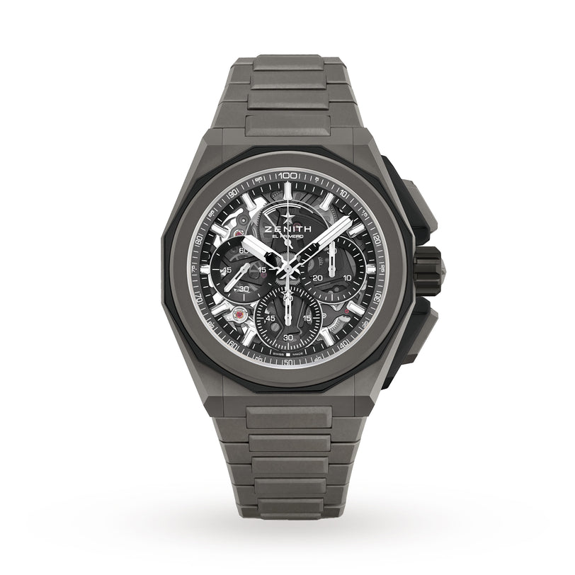 A modern Zenith Defy Extreme chronograph wristwatch featuring a skeleton dial, titanium case, black accents, and matching metal bracelet is displayed on a white background.
