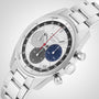 The Zenith Chronomaster EP Original features a silver case, white dial with grey, blue, and black subdials inspired by the A386, a date window at 6 oclock, and a stainless steel bracelet.
