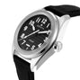 The Zenith Pilot Automatic wristwatch features a black textured dial with large white numerals and a black fabric strap, shown at an angle.