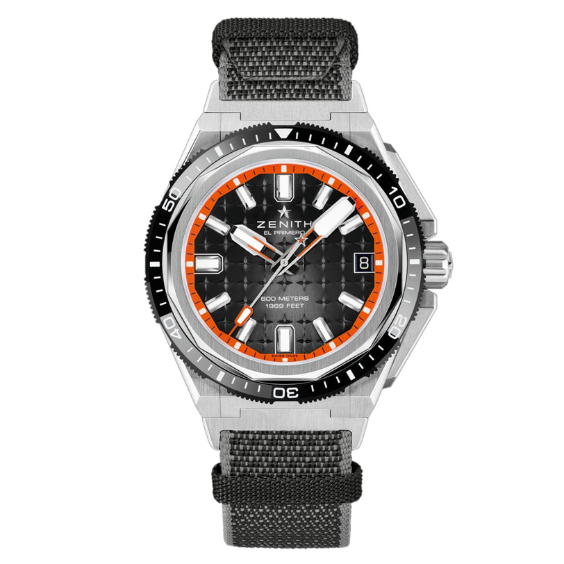 The Zenith Defy Extreme Diver features a black textured dial with orange and white accents, a black bezel, date window at 3 oclock, gray fabric strap, and reliable automatic movement.