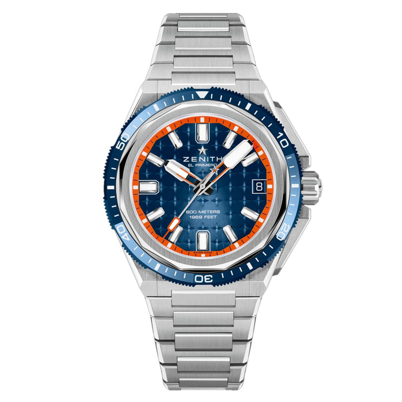 The Zenith Defy Extreme Diver is a stainless steel wristwatch featuring a blue and orange bezel, blue dial, silver hour markers, date window at 3 o’clock, El Primero automatic movement, and metal bracelet.