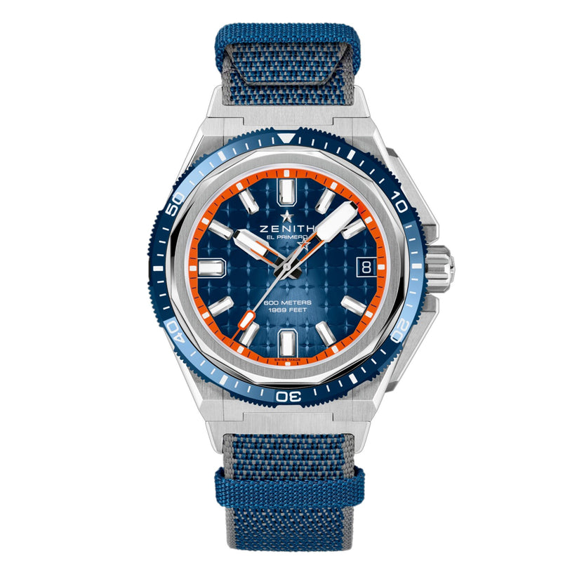 The Zenith Defy Extreme Diver features a titanium case, blue strap, blue and orange bezel, blue textured dial, white hands, orange hour markers, date display, and is water-resistant to 1000 meters.