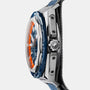 Side view of the Zenith Defy Extreme Diver wristwatch featuring a blue bezel, orange accents, and a fabric strap.