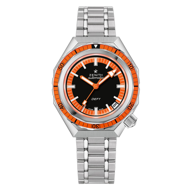 The Zenith Defy Revival diver’s watch features a silver metal band, black dial with orange and white accents, unidirectional rotating bezel, and date window at 4 o’clock. Powered by the Elite 670 automatic movement for precision.