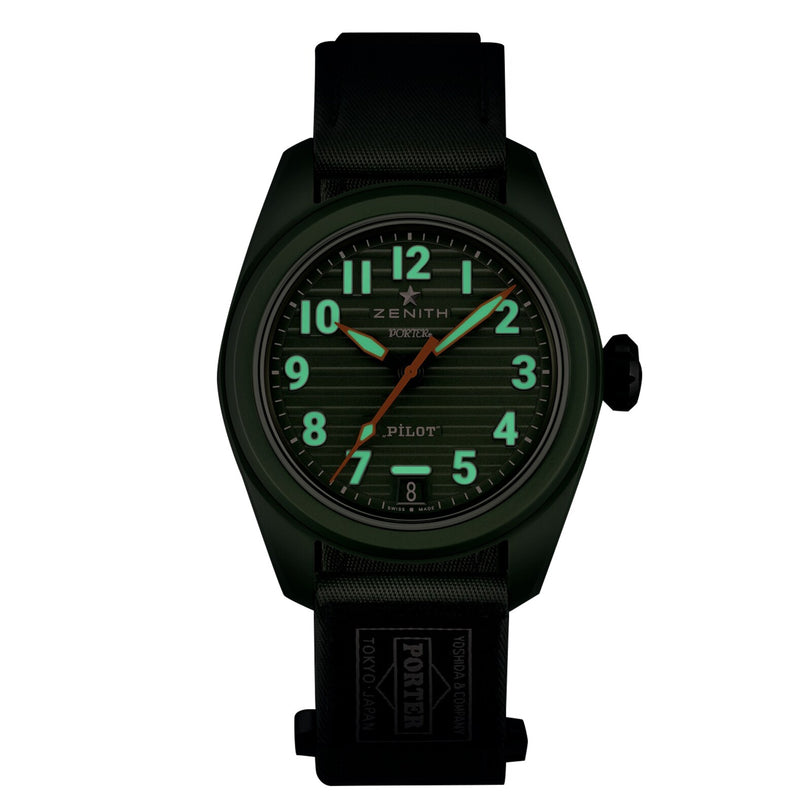 The Limited Edition Pilot Automatic Porter by Zenith features a dark band and case, glowing green numerals and hands at 10:09, “ZENITH,” “PILOT,” and “Automatic Porter” on the dial, powered by the El Primero 3620 movement.