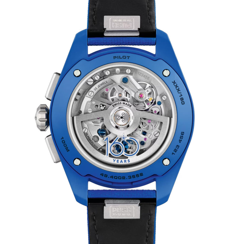 Close-up of the back of the Zenith Limited Edition Pilot Big Date Flyback 160th Anniversary Edition, featuring its exposed El Primero 3652 movement, engraved details, and a black leather strap with a metal clasp.