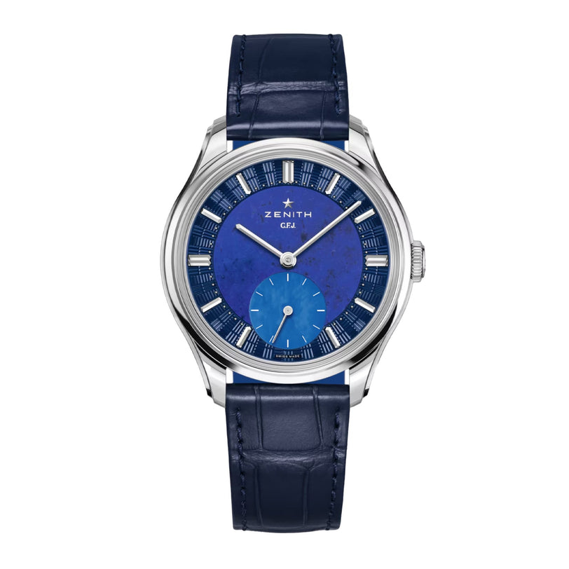 A Zenith G.F.J Calibre 135 wristwatch featuring a blue dial, silver case, and blue leather strap.