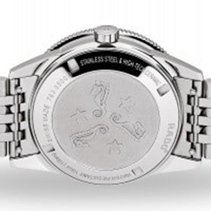 The image shows the back of the Rado Captain Cook Automatic, featuring engraved seahorses, stars, “Stainless Steel & High-Tech Ceramic,” and “Swiss Made” along the rim, blending vintage style with modern elements.