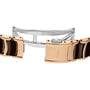 Close-up of a two-tone metal bracelet from Rado’s Centrix Automatic Diamonds watch, featuring gold and dark brown links, a fold-over clasp, and RADO engraving—highlighting the brands signature elegance and innovation.